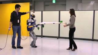 Human-Humanoid Joint Haptic Table Carrying Task with Height Stabilization using Vision snapshot