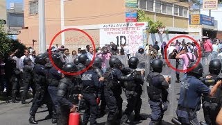 Policia dispara a maestro en la cara