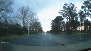 Girl Playing with traffic in Canberra