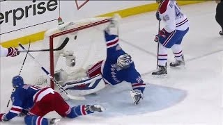 Lundqvist makes a twirling blocker save