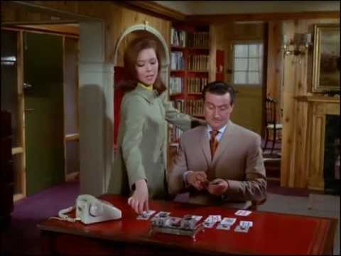 Youtube video - Steed is playing Solitaire when Emma drops round. He shows her a card trick - the two cards she chooses add up to the year of his vintage champagne; she throws down two jokers