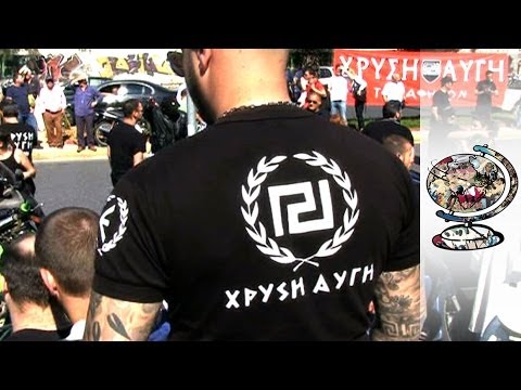 Thug Politics - Greece: The rise of the Golden Dawn political party, they claim they are saving modern Greece, but are they preaching a neo-nazi ideology?

For downloads and more information visit: http://www.journeyman.tv/?lid=65315

Greece must cut 4,000 jobs to earn its next bailout payment. But with each cut the government\'s control in the country is weakening, as the desperate populace turn to vigilante governance, Golden Dawn style.

As cuts bite ever deeper in Greece, many Greeks feel that the government can no longer provide the protection and services needed for a strong civil society. And in this frightening power vacuum the people have turned to another power: \