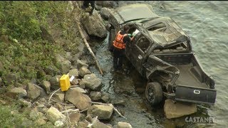 Truck over embankment