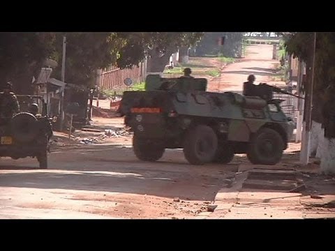 France says its UN-backed military operation is underway in the Central African Republic, the day...

euronews, the most watched news channel in Europe
     Subscribe for your daily dose of international news, curated and explained:http://eurone.ws/10ZCK4a
     Euronews is available in 13 other languages: http://eurone.ws/17moBCU

http://www.euronews.com/2013/12/06/french-troop-reinforcements-arrive-in-central-african-republic
France says its UN-backed military operation is underway in the Central African Republic, the day after some of the worst violence in the latest crisis.

The Defence Minister told French radio that troop reinforcements had arrived in the capital Bangui to bolster the forces already there - who will number 1,200 in the coming days.

On Thursday militias loyal to the ousted president attacked the capital where mainly Muslim former rebels took control in March, plunging the country into chaos that has seen tit-for-tat sectarian violence with the Christian majority. 

Witnesses said more than 100 people were killed in Thursday\'s fighting, before nightfall saw a relative calm.

Many were clubbed or hacked to death. Dozens of wounded were treated in hospital, including women and children.

The head of one aid team, MSF-Holland, said the true number of victims was unknown as it was impossible to venture out.

Many local defence groups have sprung up in response to abuses carried out by the former rebels.

President Hollande has vowed that the French operation will be limited in time with the aim of handing over to African forces.


Find us on:
     Youtube http://bit.ly/zr3upY
     Facebook http://www.facebook.com/euronews.fans
     Twitter http://twitter.com/euronews