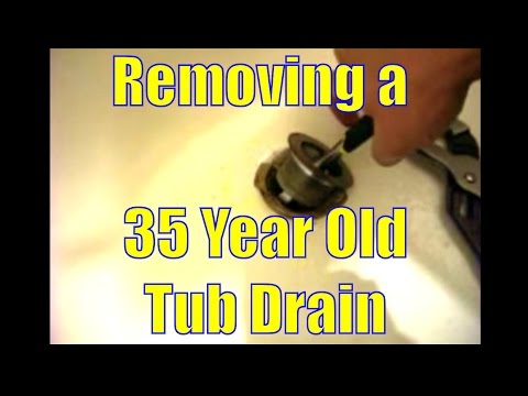 REMOVING A 35 YEAR OLD TUB DRAIN - YouTube