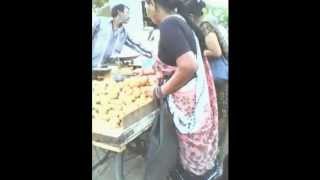 Aunty Stealing Mangoes from a Street Vendor's Cart - Smart Move Aunty