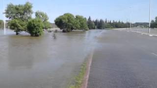 Raw video: Rushing water over First Street