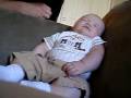 Daddy gets a funny reaction from sleepy baby Mason