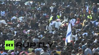 Десятки тысяч мигрантов из Африки устроили акцию протеста в Тель-Авиве