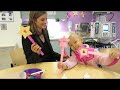 Stana Katic of ABC's Castle Blows Bubbles with Little Girl at Children's Hospital Los Angeles