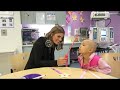 Stana Katic of ABC's Castle Blows Bubbles with Little Girl at Children's Hospital Los Angeles