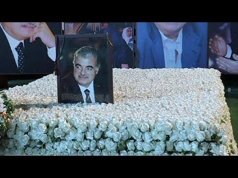 Rafik Hariri is commemorated in numerous Beirut locations. This brings the respect of some...

euronews, the most watched news channel in Europe
     Subscribe for your daily dose of international news, curated and explained:http://eurone.ws/10ZCK4a
     Euronews is available in 13 other languages: http://eurone.ws/17moBCU

http://www.euronews.com/2014/01/16/hariri-trial-a-potential-blowtorch-or-boost-for-lebanon
Rafik Hariri is commemorated in numerous Beirut locations. This brings the respect of some passers-by, and the opposite from certain others. 

Nine years after his assassination, there may be more revelations to come, and some may endanger the stability of Lebanon.

Hariri was prime minister five times, notably from 2000-2004 when the United Nations demanded that Syria withdraw its military apparatus from Lebanon and called for the Hezbollah Shiite militia to cease activities there.

Hariri\'s increasingly bold anti-Syria stance preceded his murder, although he was no longer prime minister when it happened, on 14 February, 2005. More than one tonne of explosives destroyed his motorcade. Twenty other people were also killed. 

Many people immediately believed the dark hand of Damascus was behind it. 

Lebanon was left reeling. But out of it swiftly grew the Cedar Revolution. This series of public demonstrations called for the Syrian troops to leave, and for a government free of influence by Syrian interests. 

One month after Hariri\'s death, a giant rally was held on 15 March in Beirut. A million people came.
 
Less than a month later, the Syrian\'s left. 

Public pressure with international support had pushed them out, after 30 years there. 

For many Lebanese, it had felt like three decades of occupation and manipulation of the nation\'s politics.

Yet the Syrian shadow did not disappear. The Shiite-Sunni divide remained. More attacks and assassinations followed. The key targets were anyone outspoken in their criticism of Syria\'s President Assad and his faithful allies Hezbollah.
 
The trial of Hariri\'s suspected killers carries a risk that strong tensions could flare up again. Lebanon was already prey to a deep political and institutional crisis when war developed in Syria. 

Analyst Rami Khouri with the American University in Beirut speculated about the present trial strengthening Lebanon\'s institutions.

Khouri said: \