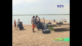 Активисты Искитимского района очищали от мусора берег залива в Тальменке