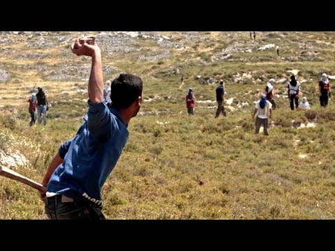 Click here for the latest British & Irish Lions Brick by Brick http://vid.io/xHF
Jewish settlers attack Palestinians in the West Bank

Subscribe to the Guardian HERE: http://bitly.com/UvkFpD

A group of masked Jewish settlers set fire to a house and fields across villages in the West Bank before attacking Palestinians. Palestinian villagers clash with the settlers on a hill overlooking the village of Orif. Israeli soldiers arrive to disperse the crowd with stun grenades. The attack was in retaliation to the killing of Israeli settler Eviatar Borovsky.