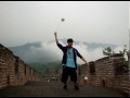 Tom playing poi on the Great Wall of China
