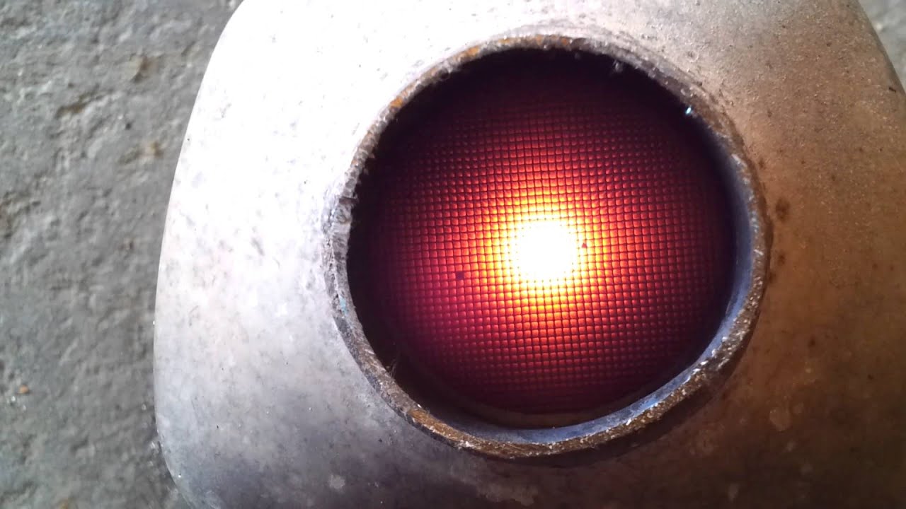 Catalytic converter glowing red hot after removal - YouTube