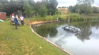 Car in Bilston fishing pool