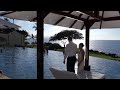 Bride and groom jump in pool at Wailea Beach Resort Maui Hawaii