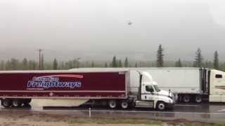 Canmore flooding - Cougar creek flooding the Trans Canada highway