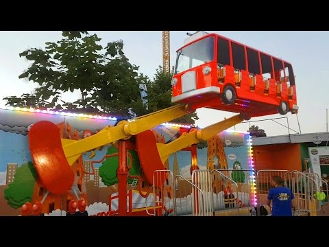 Outdoor playground for kids with flying bus. Funny video from KIDS TOYS CHANNEL