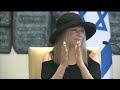 President Peres and Barbra Streisand together with children from the Make-A-Wish foundation