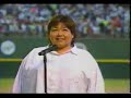 Roseanne sings the National anthem