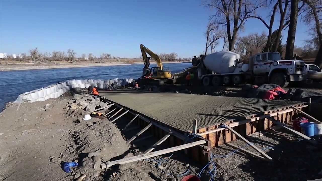 Holding back the river to install an immovable boat ramp ...