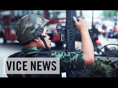 Subscribe to VICE News here: http://bit.ly/Subscribe-to-VICE-News

Thailand\'s military detained former prime minister Yingluck Shinawatra on Friday in the latest development of the country\'s unraveling political crisis.

The army, which is consolidating its grip on Thailand following Thursday\'s coup d\'état, barred 155 prominent citizens from leaving the country.

More from VICE News:

\