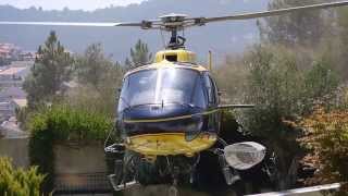 Water bombing helicopter filling at a swimming pool (another angle)