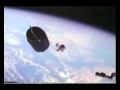 UFO Appears behind Spacewalker