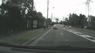 Idiot Driver makes an Illegal U Turn.avi