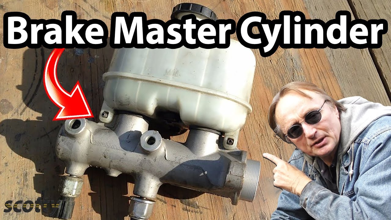 brake fluid leaking between master cylinder power booster