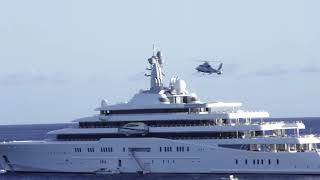 Helicopter landing on the largest yacht in the world.