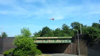 The West Midlands Air Ambulance takes off after this afternoon's crash on the A449