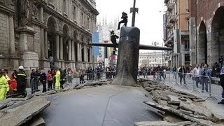 Incredible moment submarine breaks the surface of a Milan STREET...