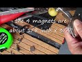 Taking apart old hard drive to recycle the expensive neodymium magnets