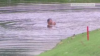 Golfer Pablo Larrazabal escapes attack of HORNETS by jumping in the lake