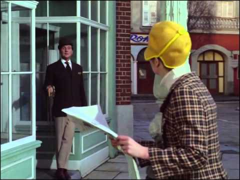 Youtube video - Mrs. Peel buys the morning paper, only to discover the front page now reads ‘Mrs. Peel - we’re needed!’ as Steed smirks at her from a nearby doorway