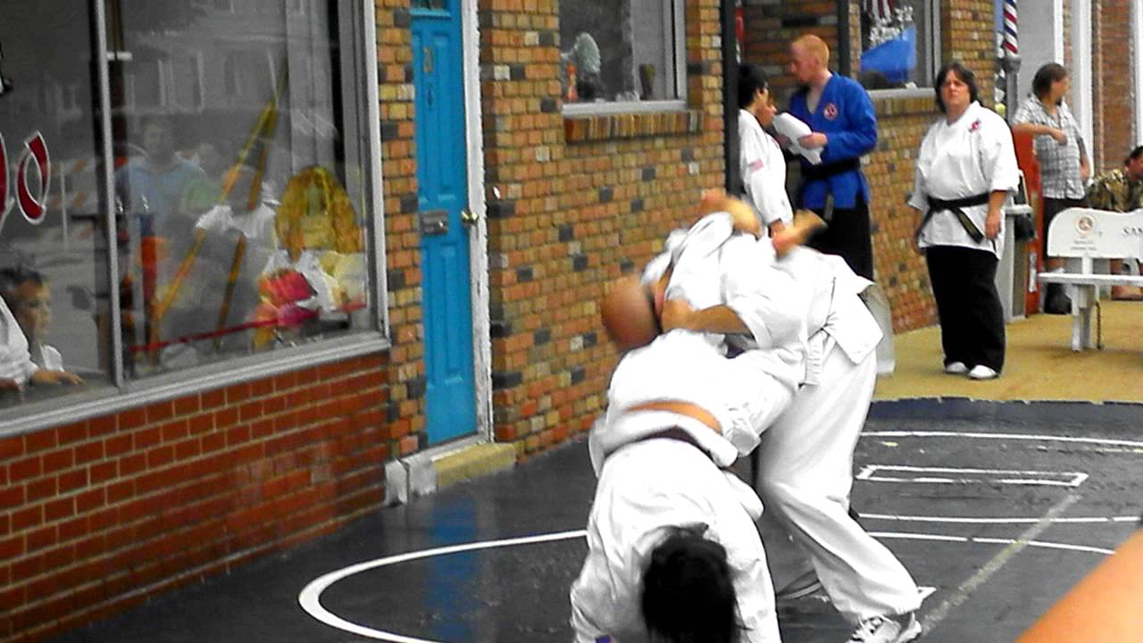 Girl vs. man in karate match. - YouTube
