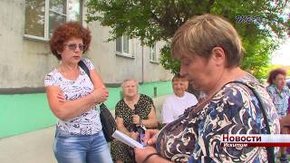 Жители многоквартирного дома в Искитиме пытаются выяснить, откуда у них появился большой долг по горячей воде