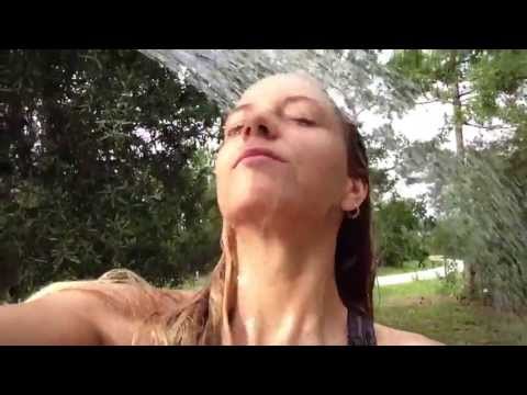 Trina Mason #nomakeup playing in a hose on a hot day