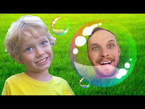 Children and adults play soap bubbles to children's fun music