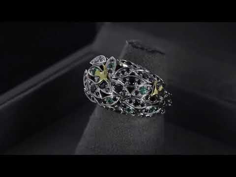 Кольцо «Слон» из комбинированного золота с изумрудами и черными бриллиантами