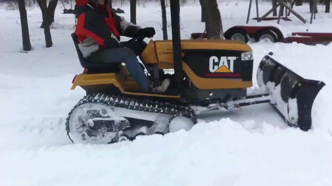 Mini Cat Challenger Tractor snow plowing - YouTube