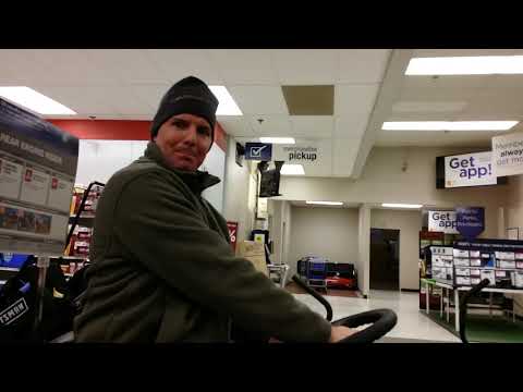 Daddy on a lawnmower being silly
