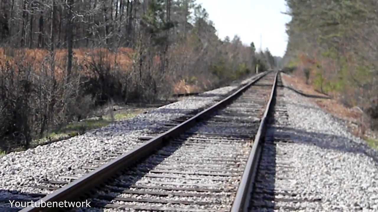 Ghost waiting for a train on an abandoned railroad track - YouTube
