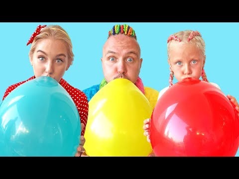 Alisa plays outdoor games with Balloons and have fun with dad and mum