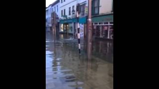 Man swims on Oliver Plunkett Street