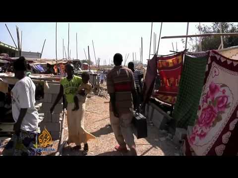 There are fears that fighting fuelled by ethnic rivalry in South Sudan could descend into a civil war. Violence has flared beyond the capital, Juba, three days after what the government says was an attempted coup. Hundreds of people have been killed, and thousands of others are sheltering in UN compounds. Al Jazeera\'s Stefanie Dekker reports.