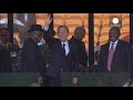 The life of Nelson Mandela celebrated at rain-soaked memorial